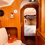 Surfbird Cozy Sailboat Escape